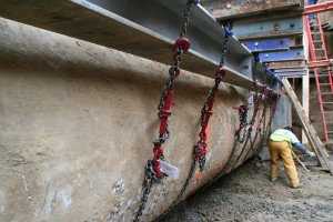 60" Concrete Pipe suspended by a grid of beams
